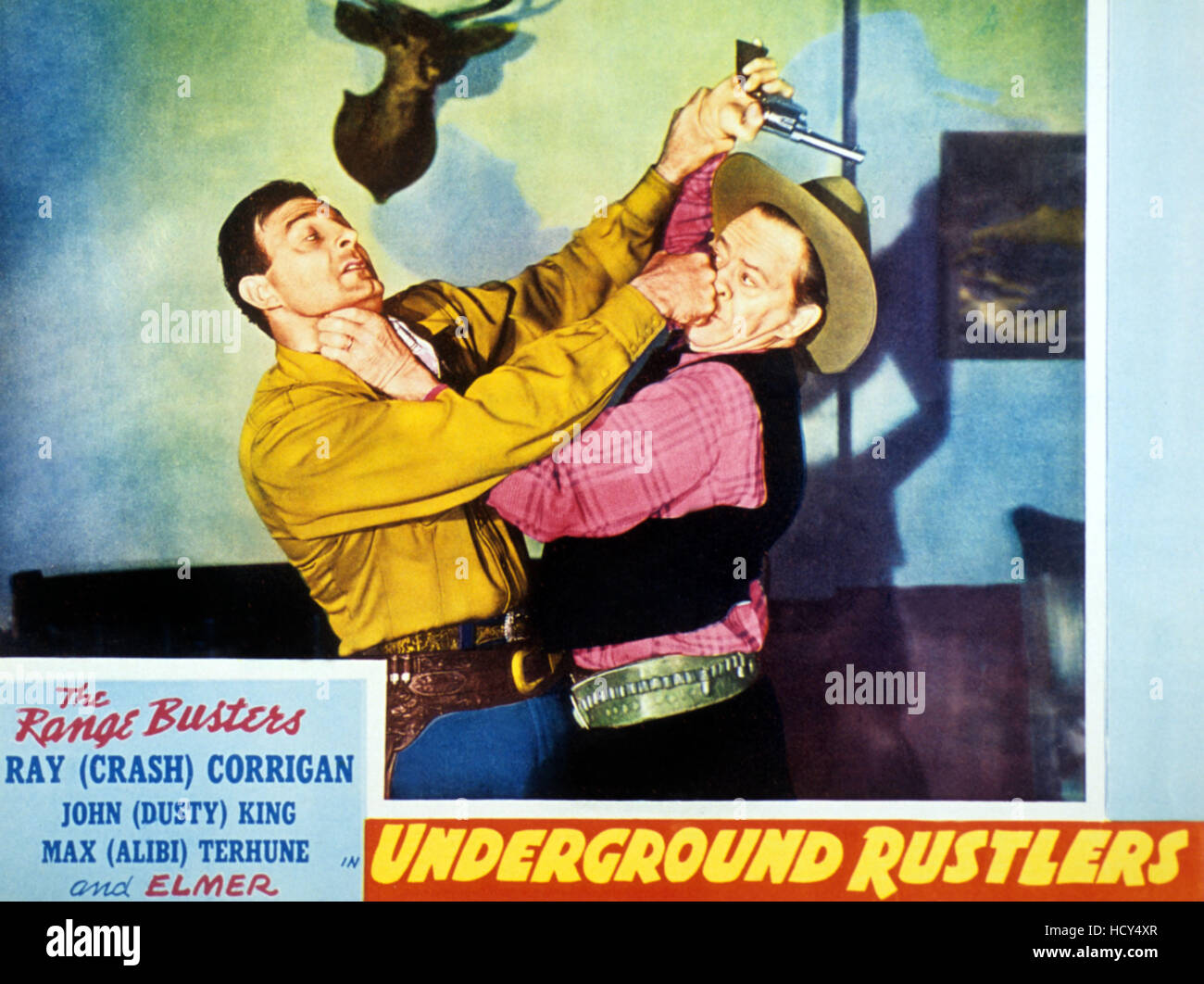 UNDERGROUND RUSTLERS, left Ray 'Crash' Corrigan on lobbycard, 1941