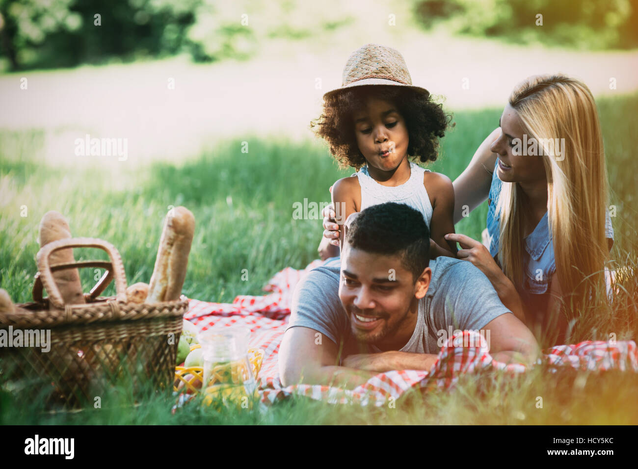 Family having fun and picnic in nature Stock Photo