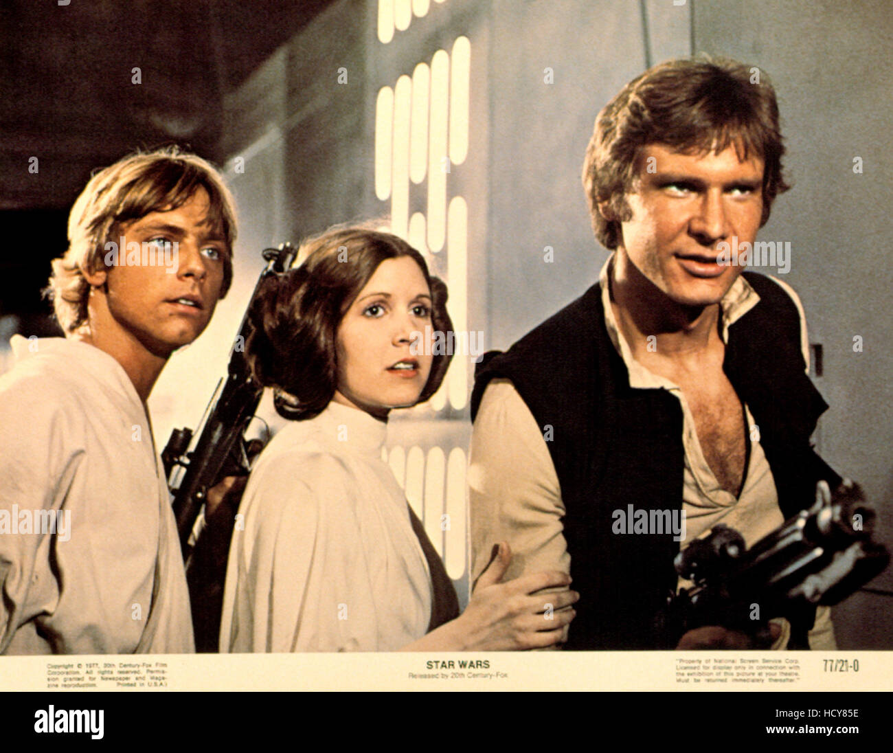STAR WARS, (aka STAR WARS: EPISODE IV - A NEW HOPE), Mark Hamill, Carrie Fisher, Harrison Ford, 1977 Stock Photo