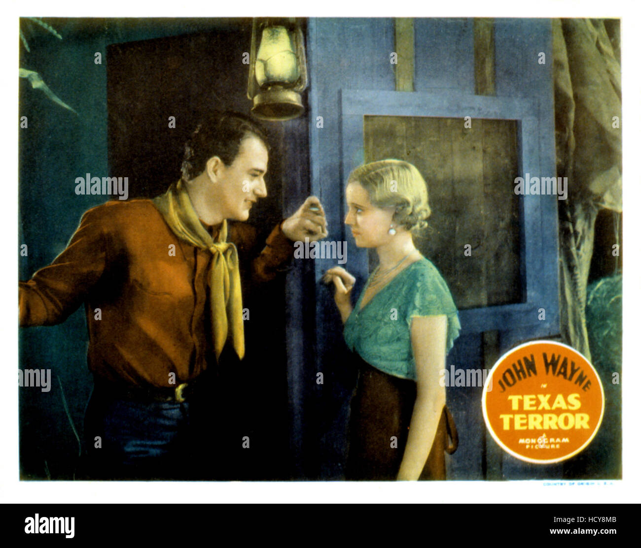 TEXAS TERROR, John Wayne, Lucile Browne, 1935 Stock Photo Alamy