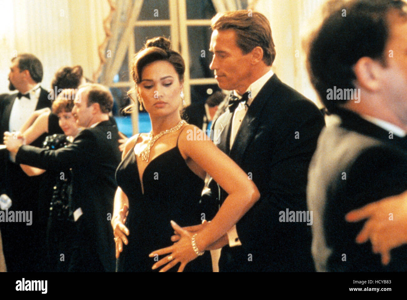 TRUE LIES, Tia Carrere, Arnold Schwarzenegger, 1994, TM and Copyright