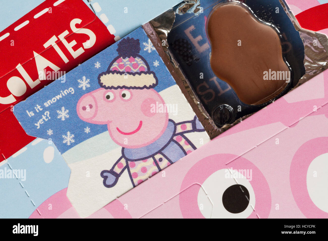 Detail of Kinnerton milk chocolate Peppa Pig advent calendar showing open door - is it snowing yet Stock Photo
