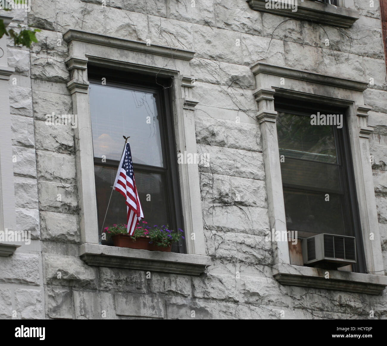 NEW YORK American patriotism with a flag in the window 2008 Stock Photo