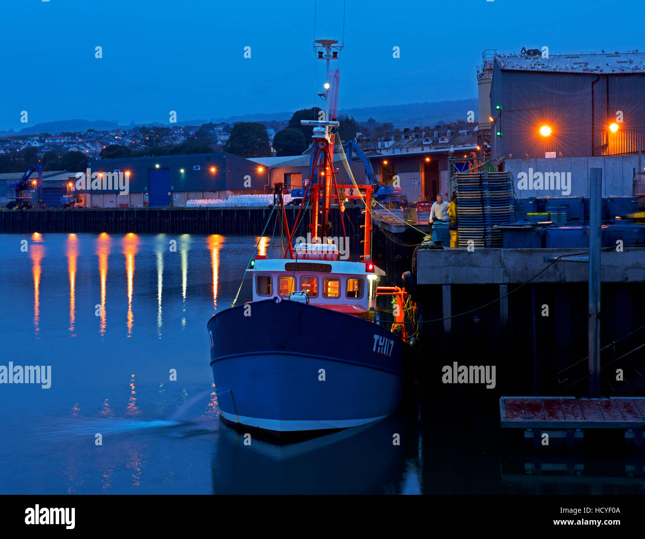 Trawler unloading fish at the quayside, Teignmouth, Devon, England UK Stock Photo
