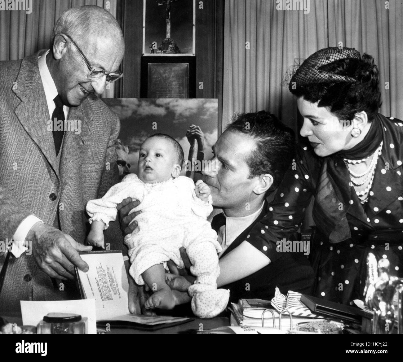 Cecil B. DeMille signs newborn Fraser Heston to appear as baby Moses in