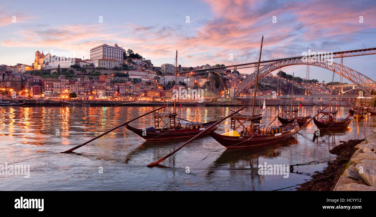Portugal, Porto, port wine barges and the Ribeira district at dusk