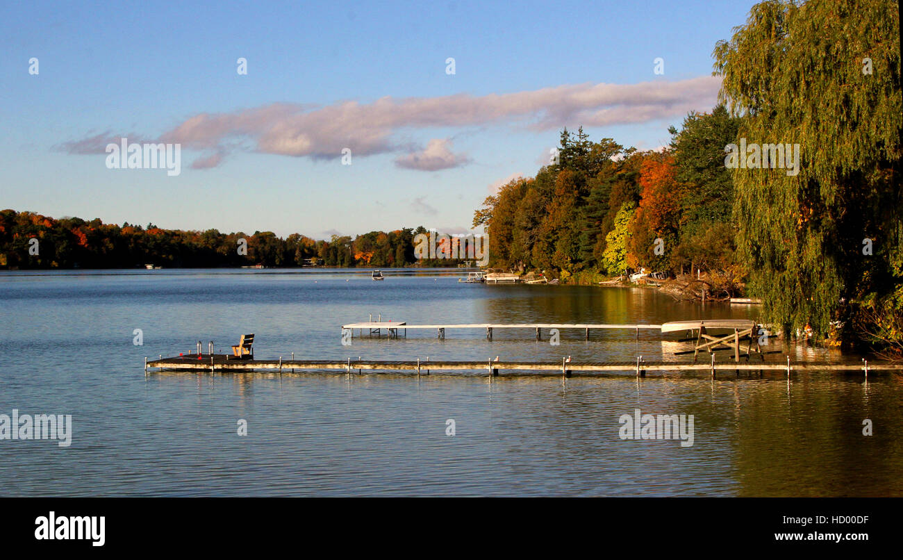 Deck chair on the jetty on Elkhart Lake, Elkhart, Wisconsin Stock Photo
