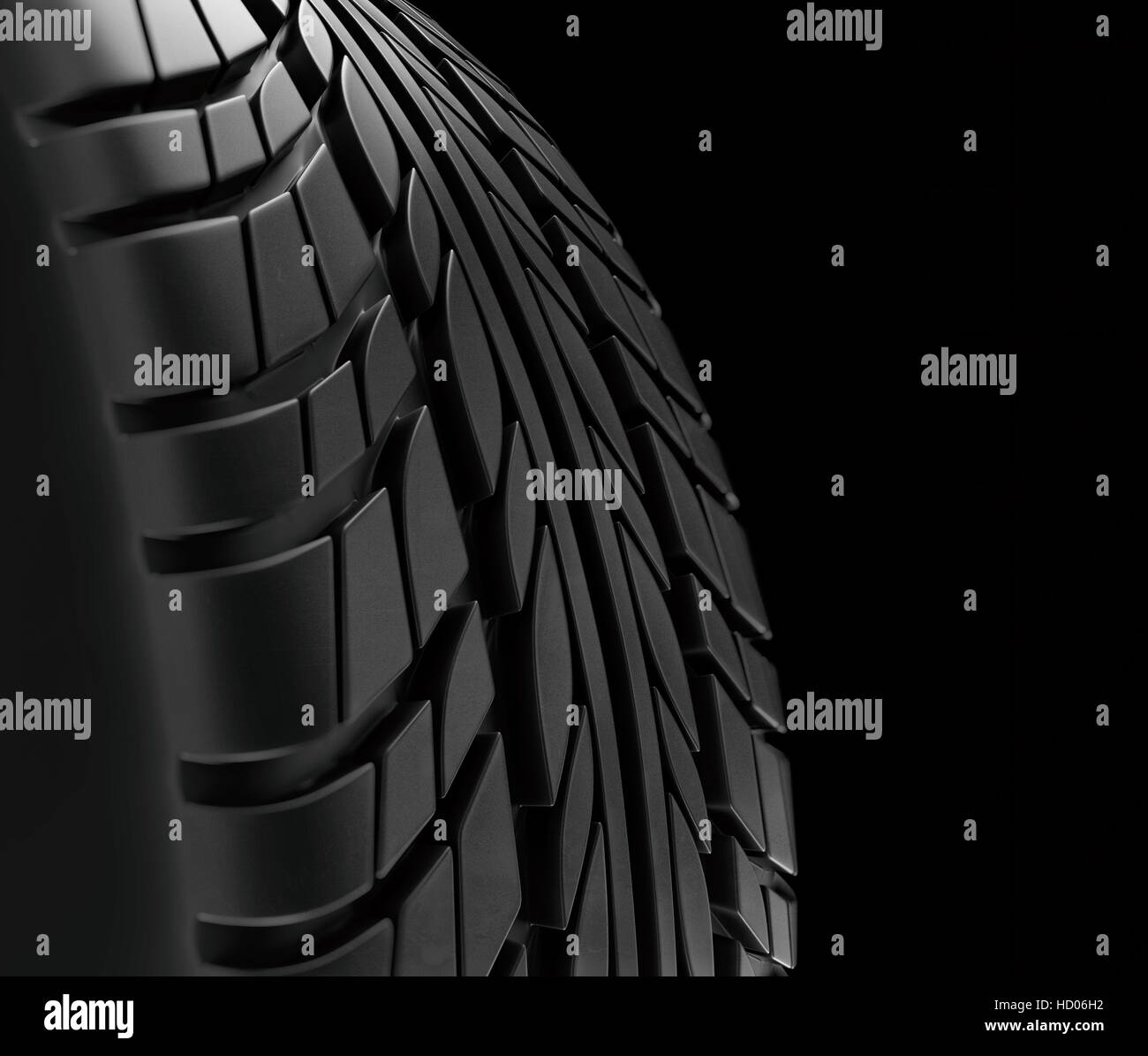 Car tires closeup Winter wheel profile structure on black background