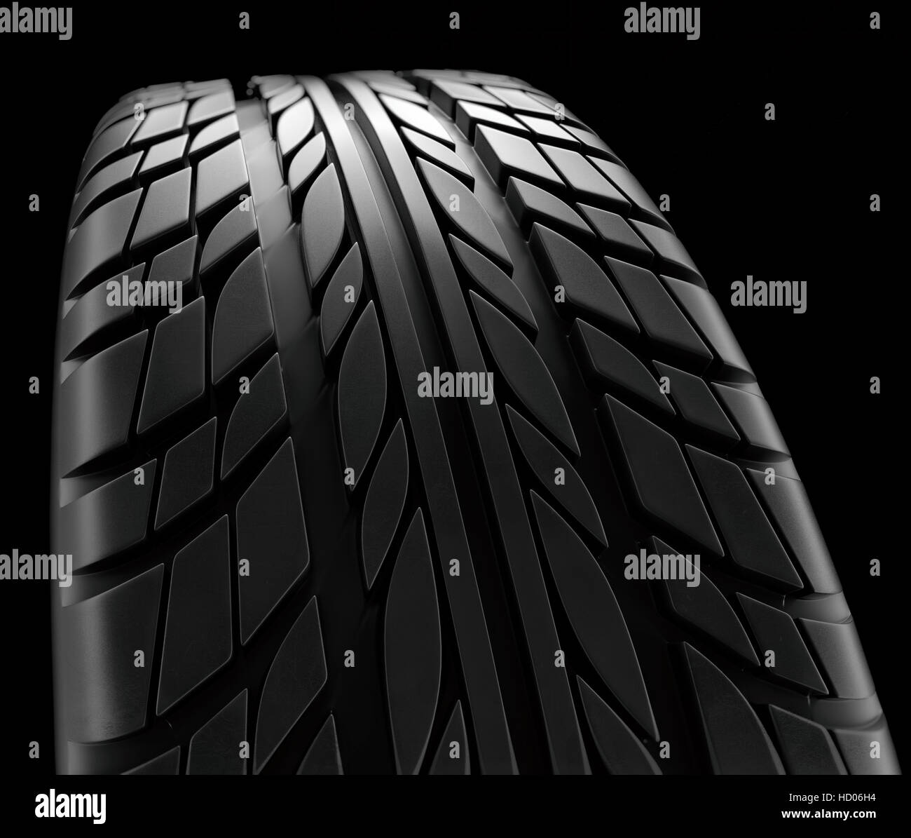 Car tires closeup Winter wheel profile structure on black background