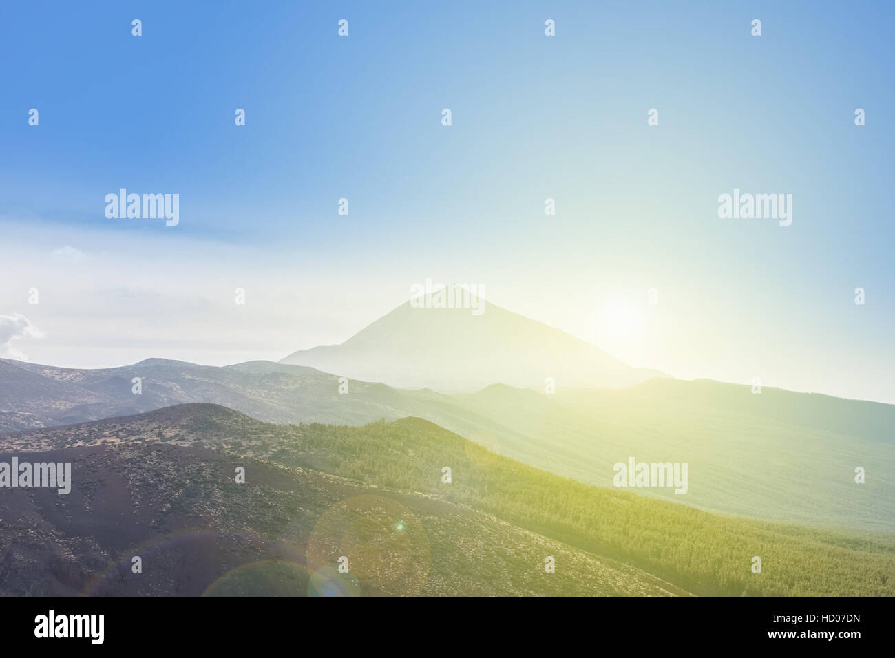 Forest, mountain landscape - blue sky and sun - Pico del Teide, Tenerife Stock Photo