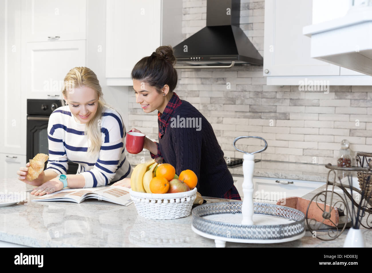 Two Girls Friends Preparing Breakfast And In A Kitchen Concept Cooking Culinary Healthy Lifestyle Stock Photo Alamy