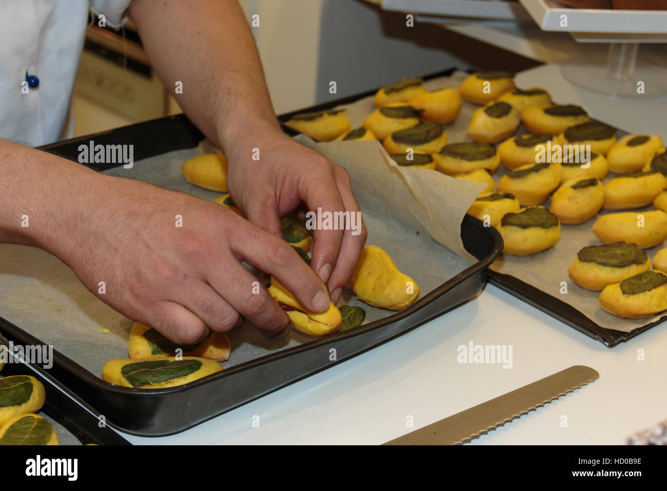 Preparation of Italian Deepfried Pizza Roll with Mints Leaf Stock