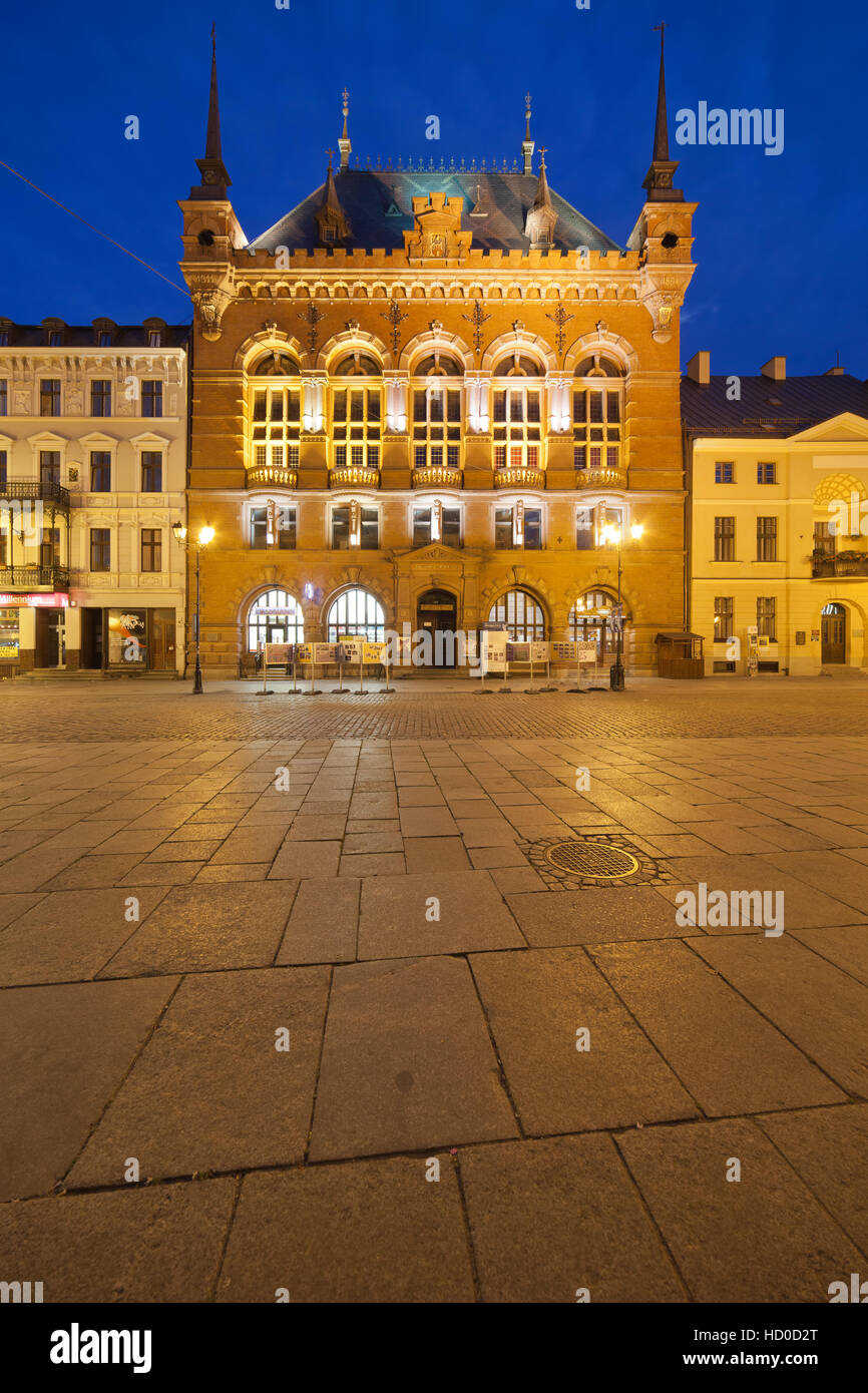Artus Court by night in Torun, Poland, view from the Old Town Market Square, city landmark Stock Photo