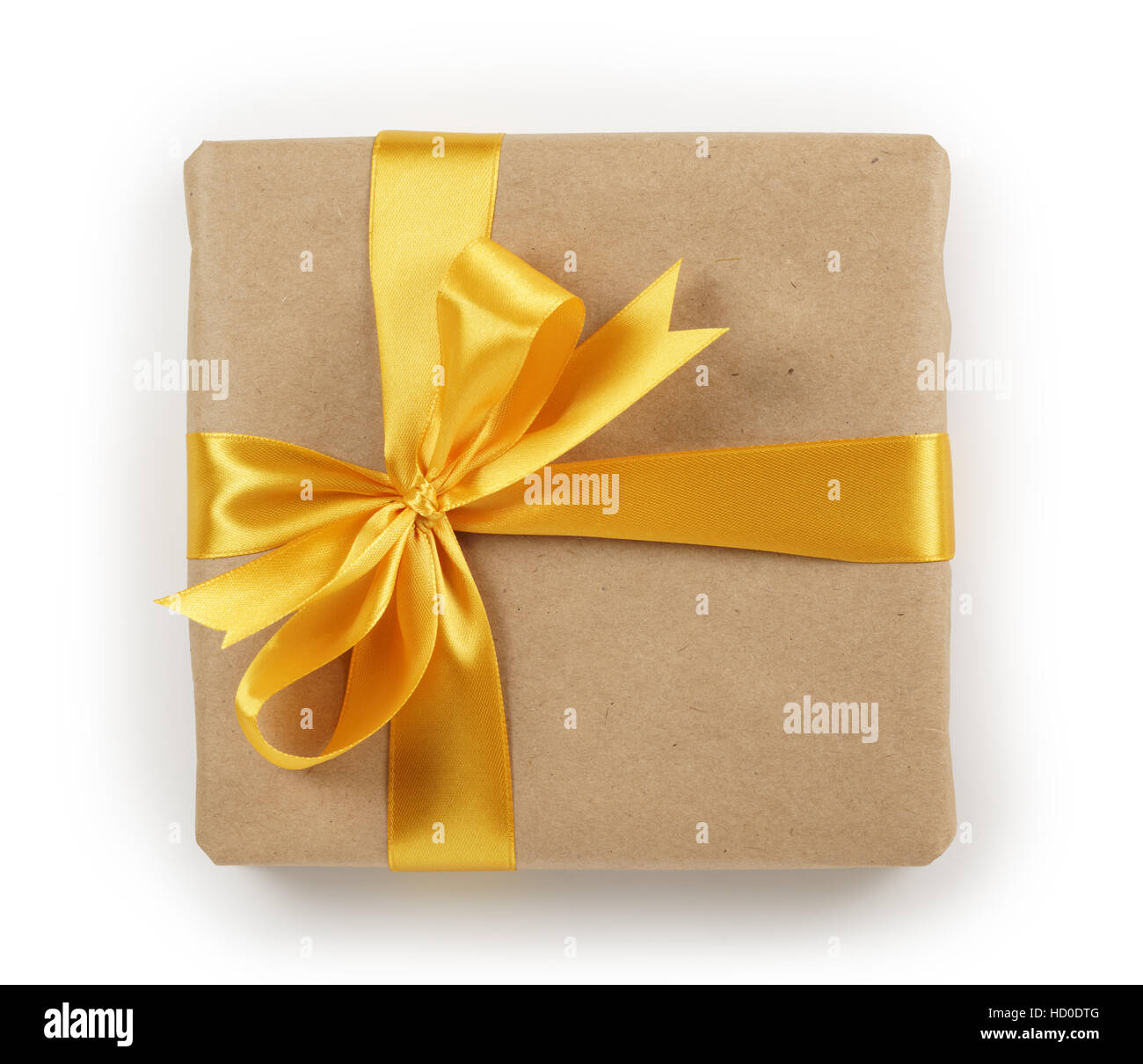 brown paper gift box with golden ribbon bow top view Stock Photo Alamy
