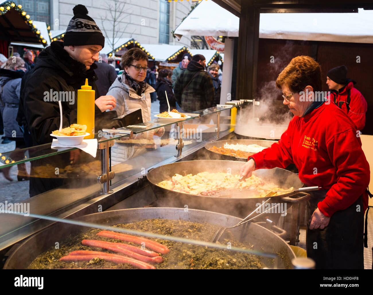 Traditional food stall at Berlin Christmas Market, Germany Stock Photo