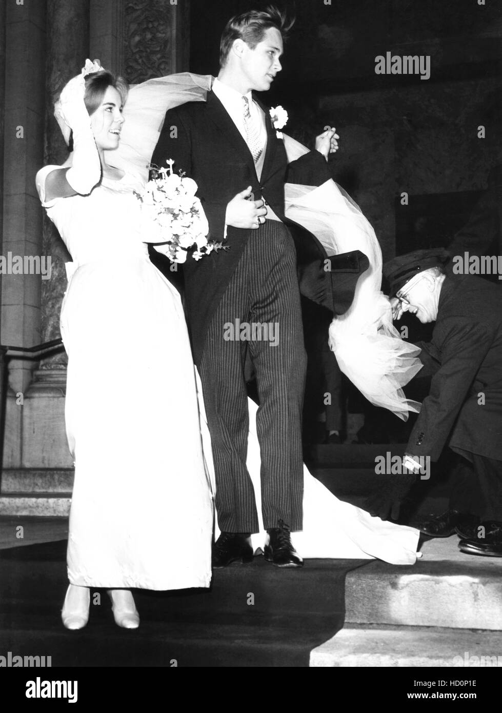 From left: Susan Margot Maw and Brandon De wilde leaving the church after  their wedding on a windy December day, 1963 Stock Photo - Alamy