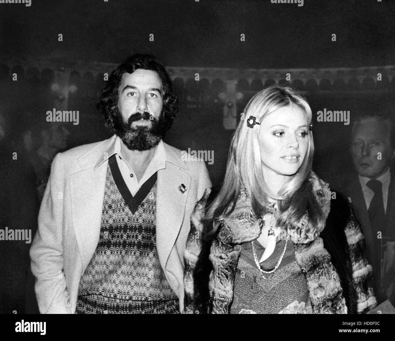 From left: Lou Adler, Britt Ekland arriving at London theater to see ...