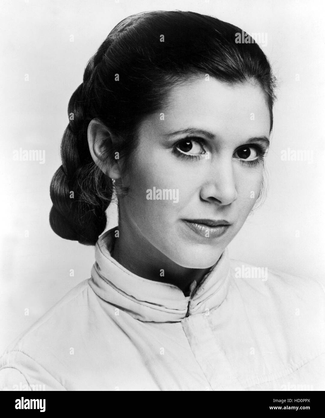 STAR WARS: EPISODE IV - A NEW HOPE, Carrie Fisher, 1977. (c) Lucas Films/Courtesy Everett Collection. Stock Photo