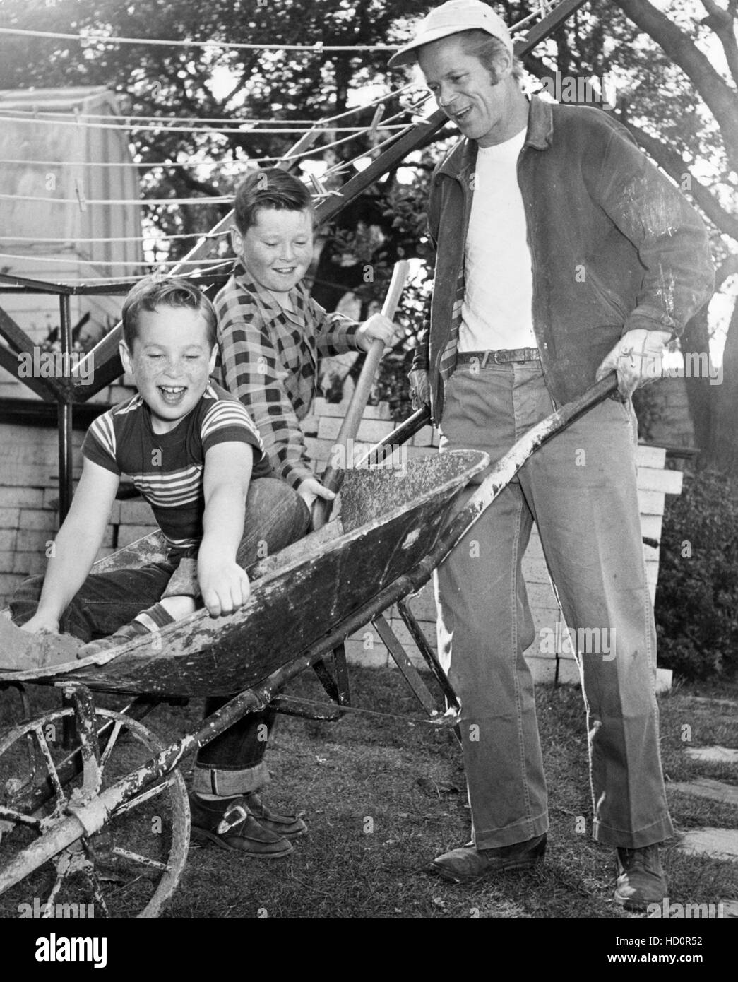 Dan Duryea (right) playing with his sons, Richard Durea (front) and Peter Durea (back), ca