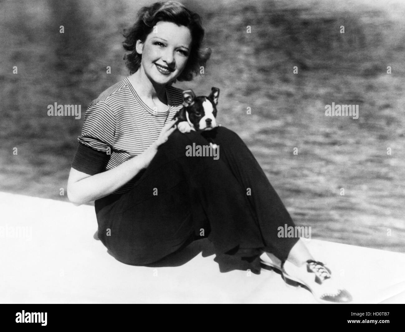 Dixie Lee, (aka Dixie Lee Crosby), with her pet Boston terrier, 'Bingo