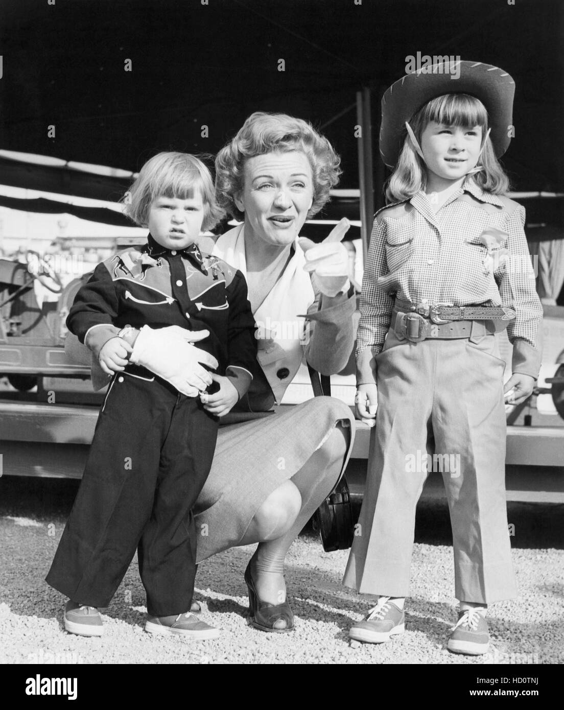 Eve Arden, with daughters, Connie West (left) and Liza West, early