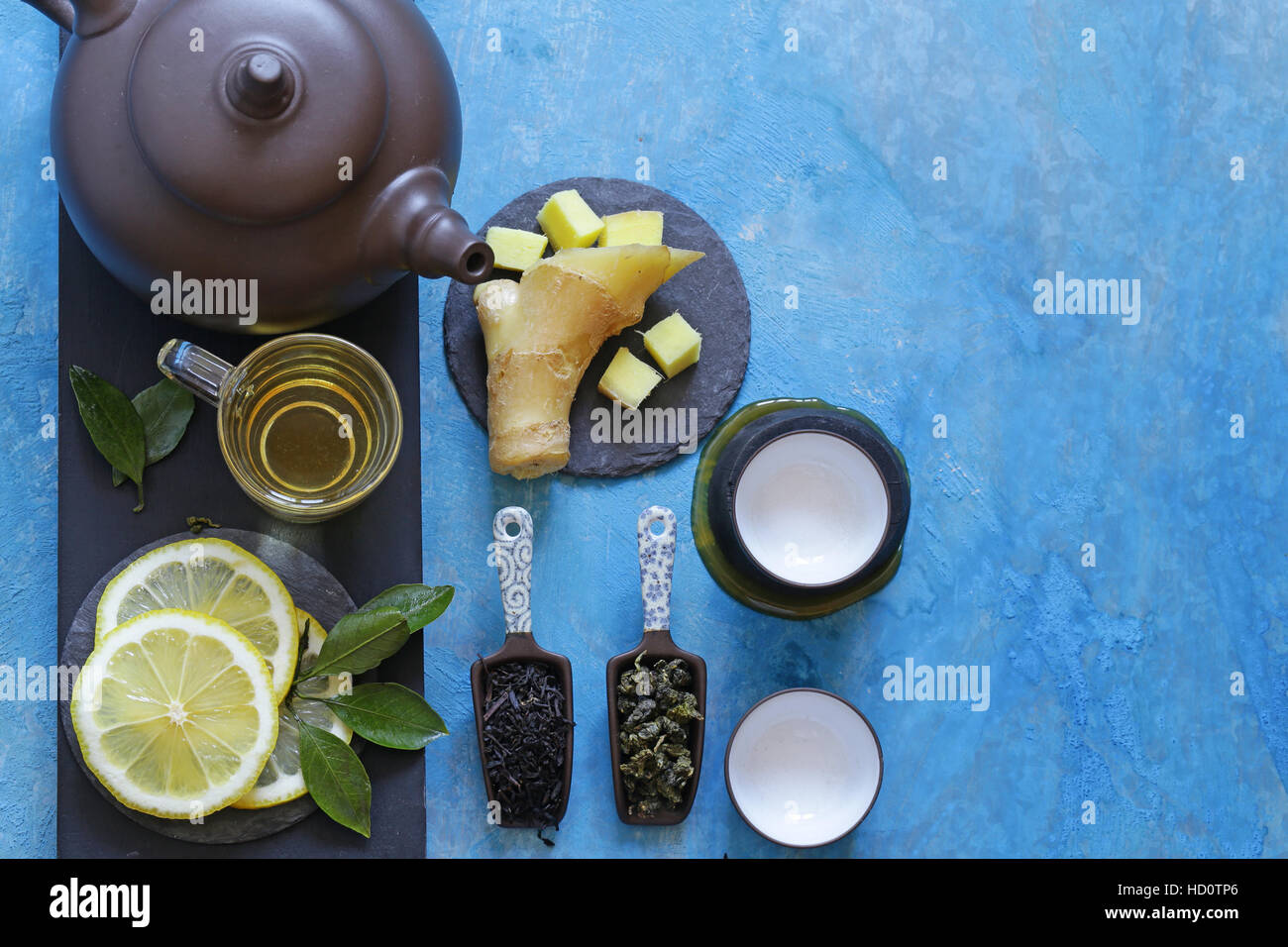 Tea set with ginger, lemon and honey Stock Photo - Alamy