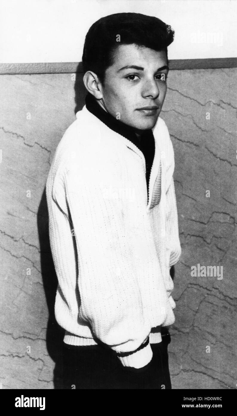 Frankie Avalon, in the Milwaukee Safety Building, being warned about