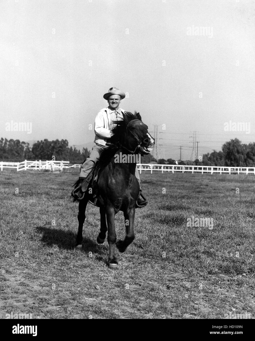 James Cagney, riding his horse 'Jim Dandy', 1955 Stock Photo Alamy