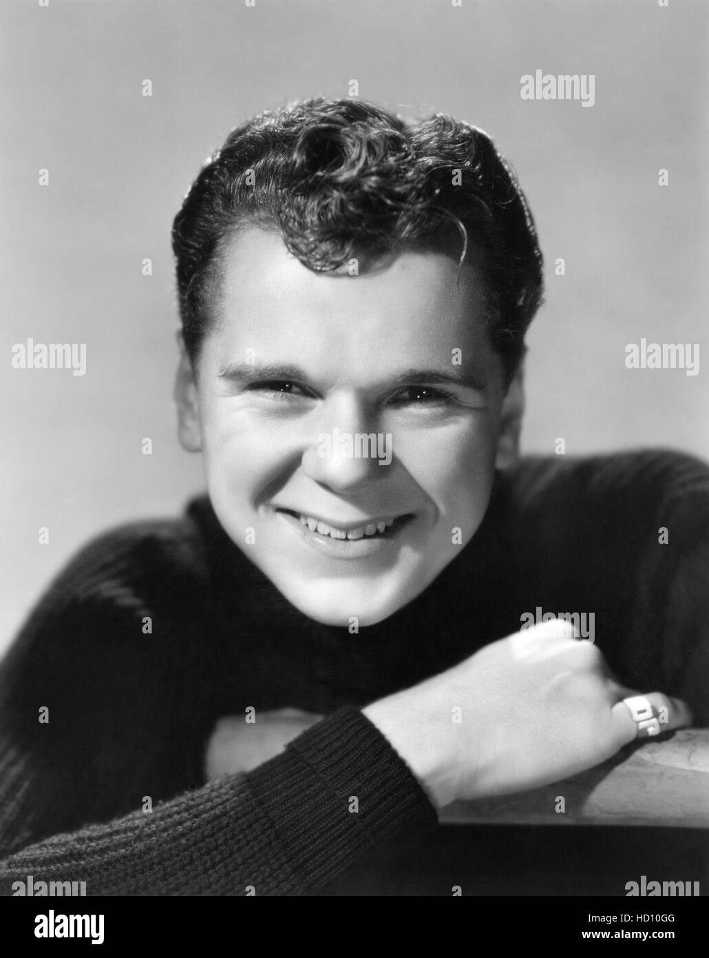 Jackie Cooper, wearing a monogramed pinkie ring, 1942 Stock Photo - Alamy