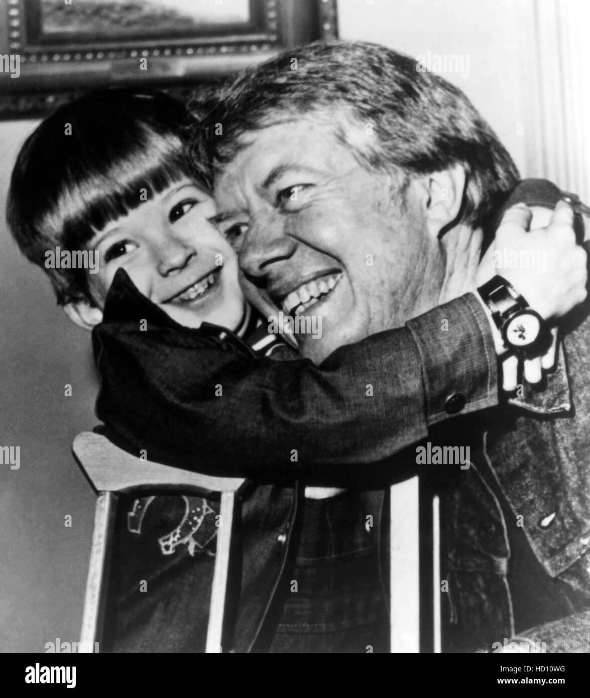 President Jimmy Carter (right) being hugged by Robbie Zastavny during ...