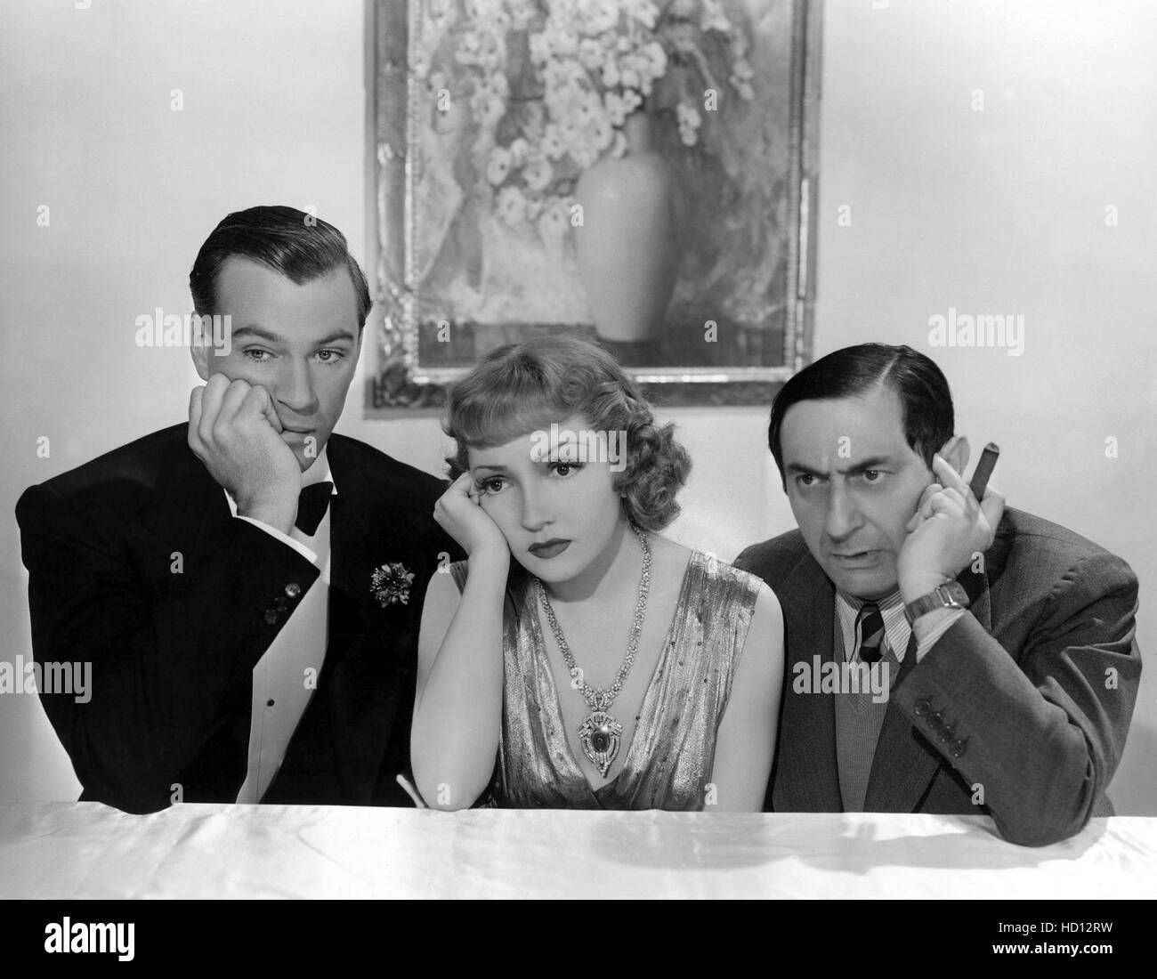GARY COOPER, CLAUDETTE COLBERT and ERNST LUBITSCH pose for gag shot ...