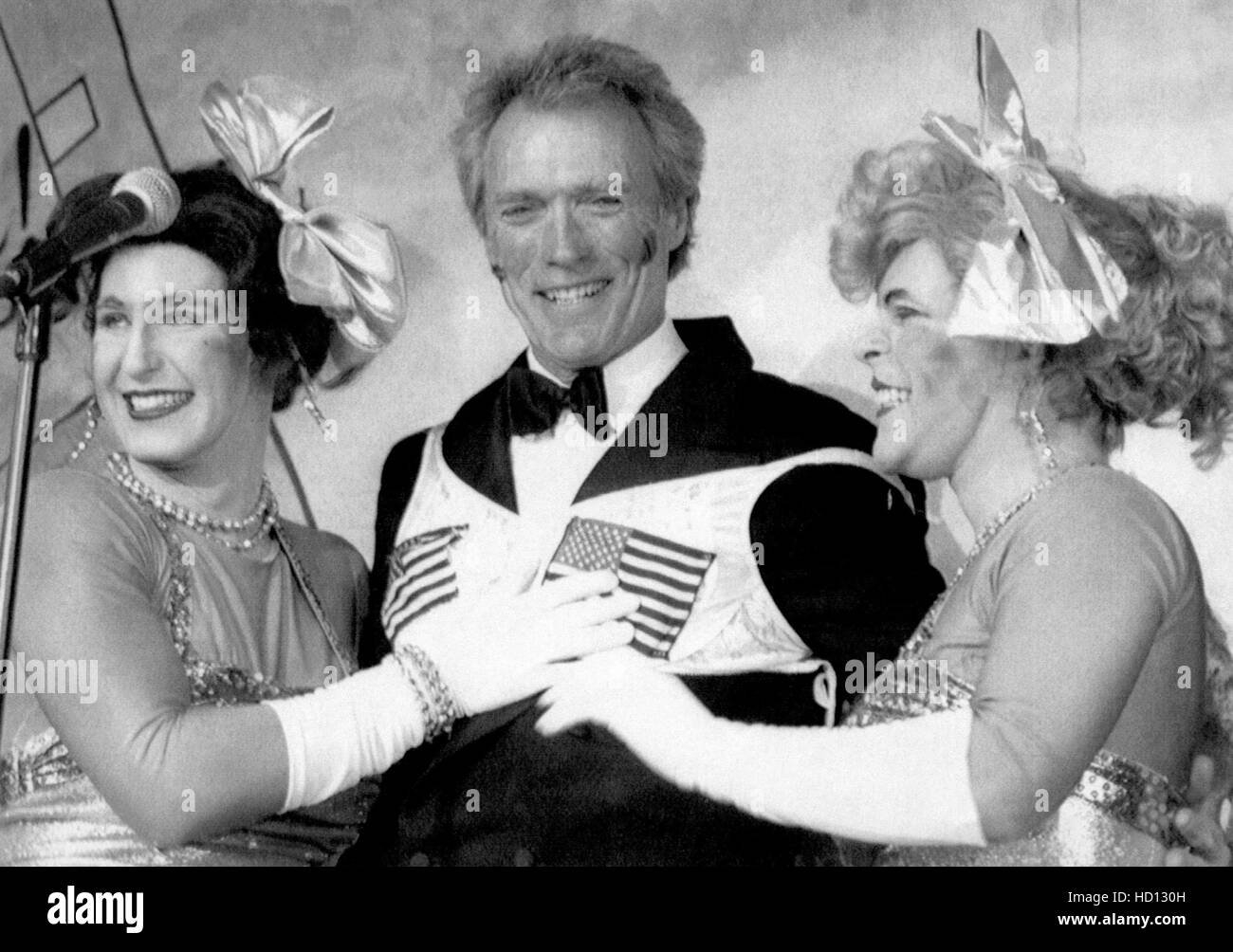 Clint Eastwood, center, receives his Man of the Year award at the