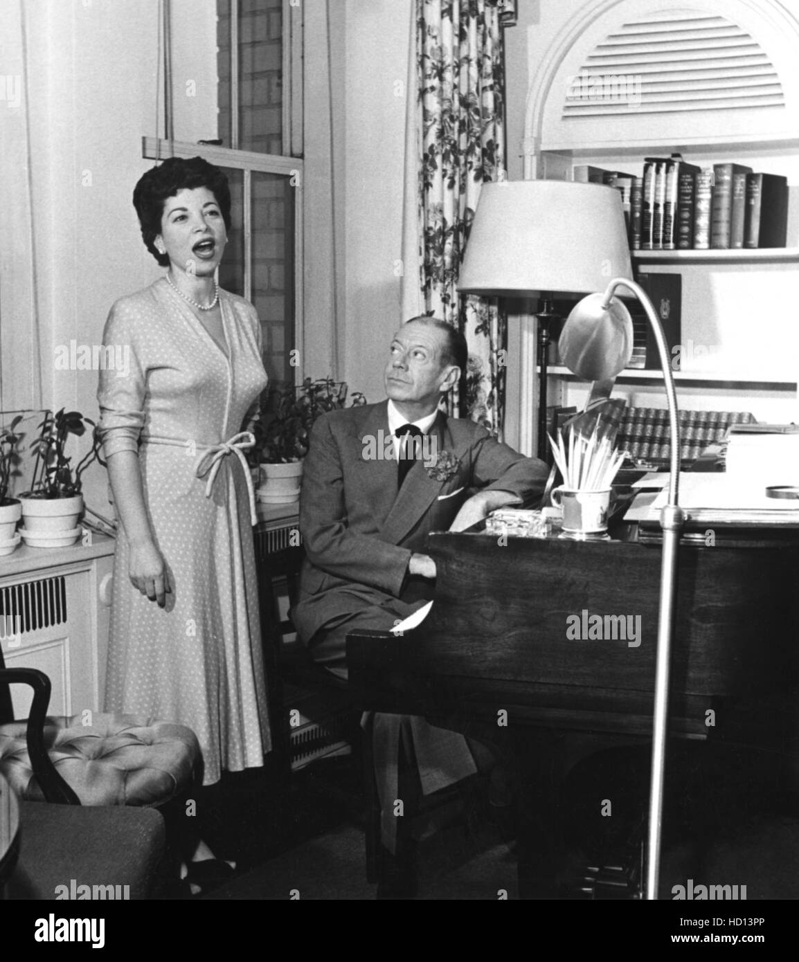 Louise Carlyle rehearses a number with composer Cole Porter at the