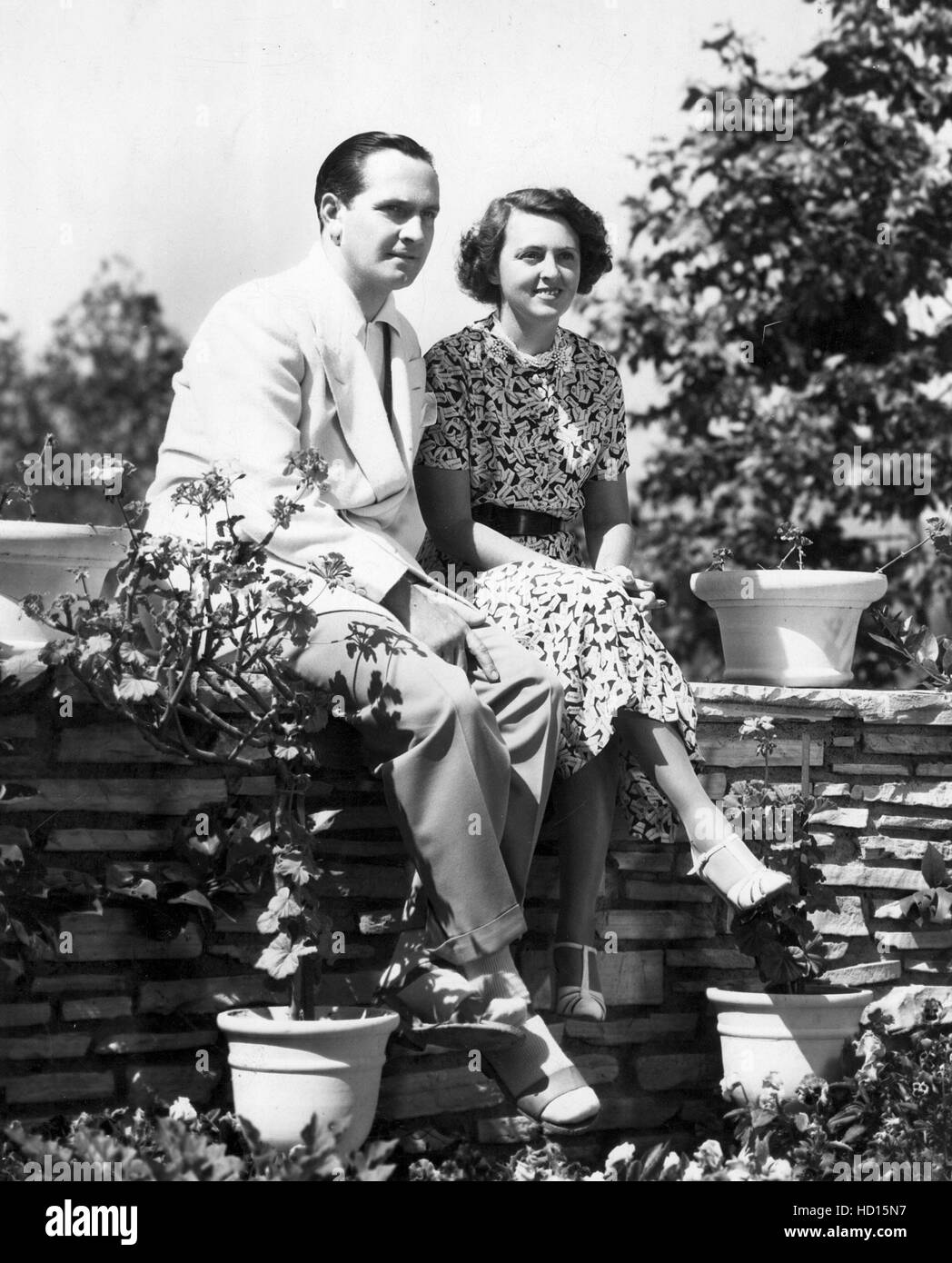 FREDRIC MARCH and wife FLORENCE ELDRIDGE at their Holmby Hills home, 9/38 Stock Photo