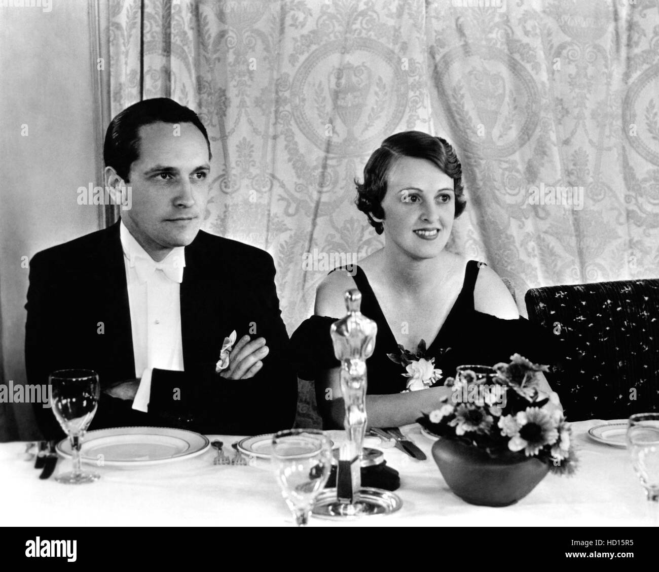 Fredric March, with his wife, actress Florence Eldridge, at the Academy Wards ceremony, where he won a Best Actor Oscar for DR. Stock Photo