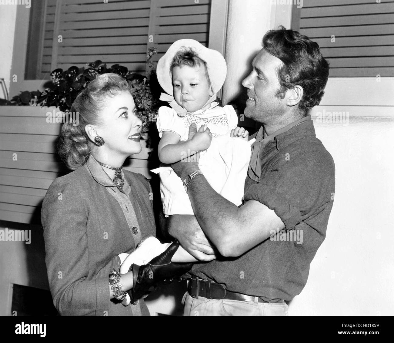 Ida Lupino, left, and her third husband, actor Howard Duff, with their daughter, Bridget Duff