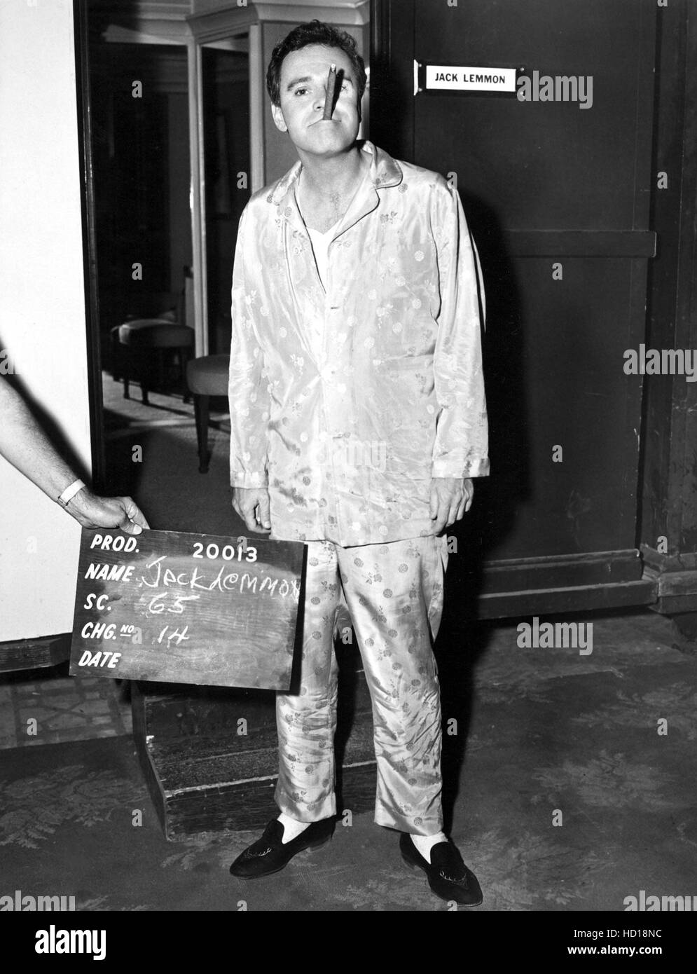JACK LEMMON in pajamas emerges from dressing room ready for “action