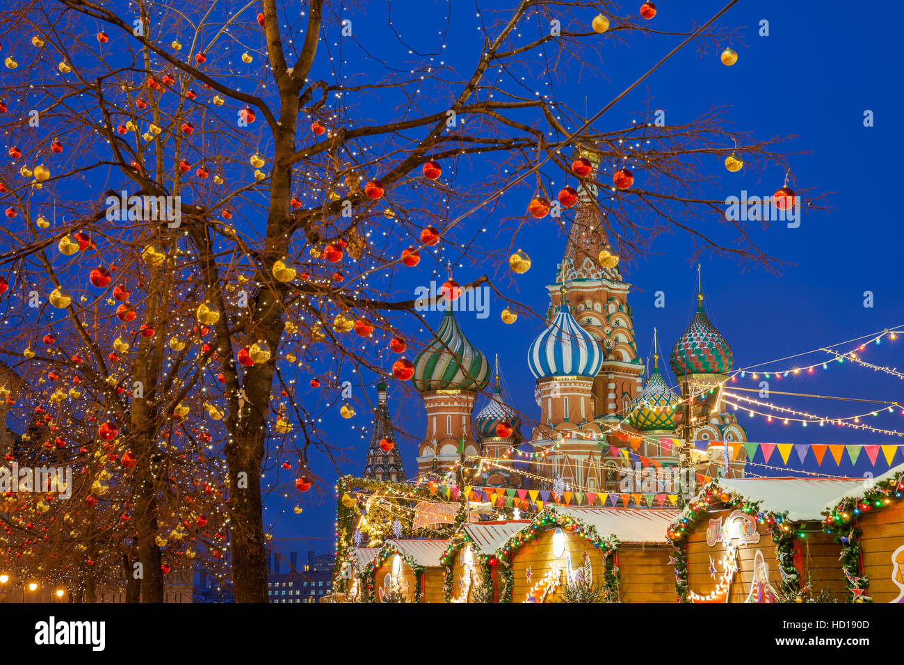 Christmas decorations at the Red Square with St. Basils Cathedral on the background, Moscow, Russia Stock Photo