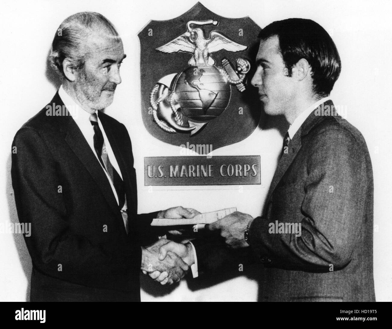 JAMES STEWART congratulates his stepson RONALD McLEAN STEWART upon the