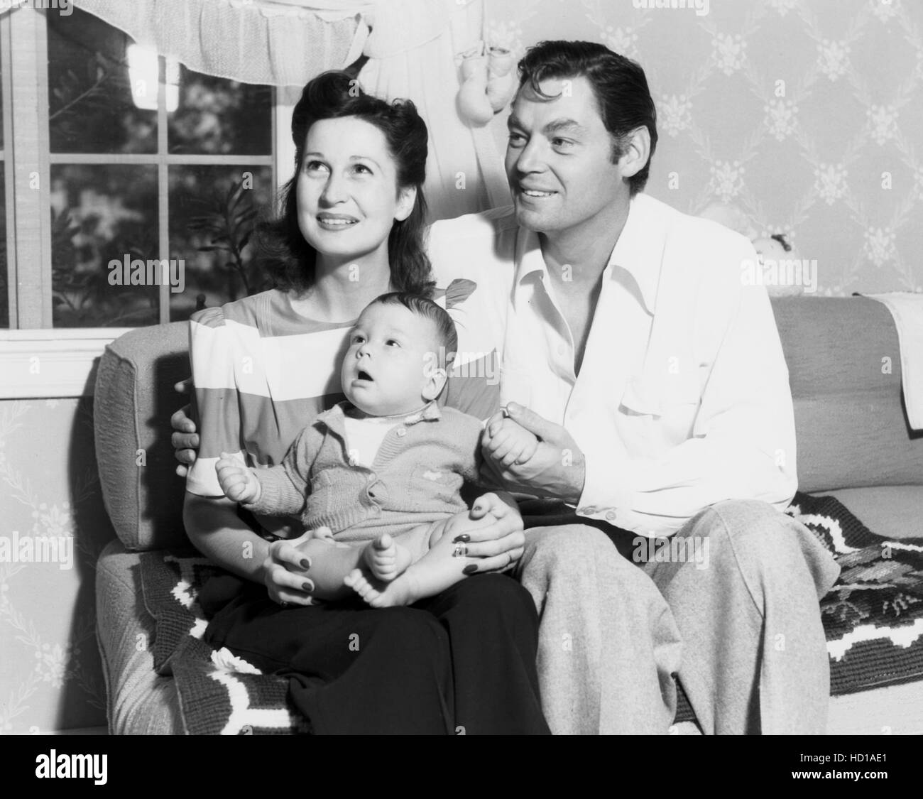 Johnny Weissmuller, right, and his fourth wife, Beryl Scott, with their sixmonthold son