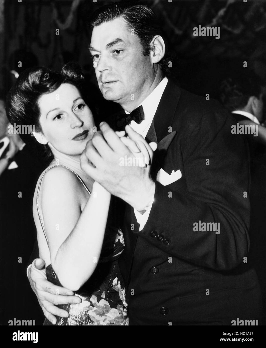 Johnny Weissmuller, right, and his fourth wife, Beryl Scott, at the Westside Tennis Club