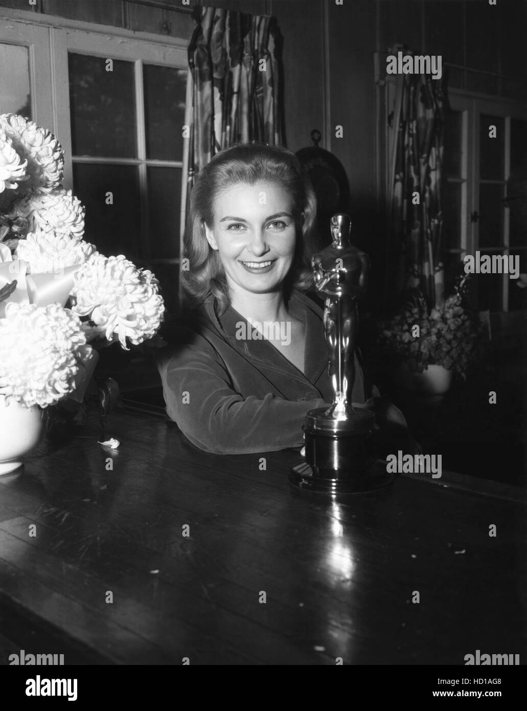 Joanne Woodward, with her Oscar for Best Actress for THREE FACES OF EVE ...