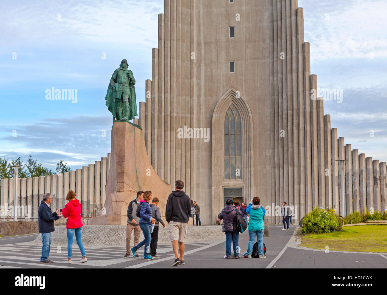 A view of people, tourists and the Hallgrimskirkja Lutheran Church in Reykjavik, Iceland. Stock Photo