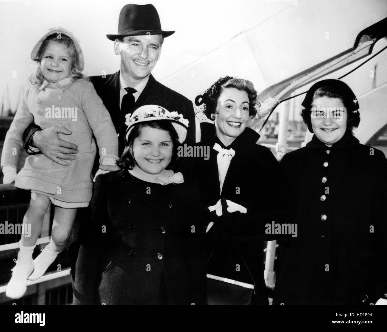 Douglas Fairbanks, Jr., wife Mary Lee Hartford, daughters Melissa (far  left), Victoria, Daphne, aboard the Queen Mary Stock Photo - Alamy