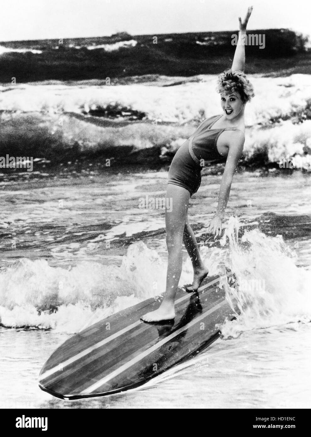Dorothy Lee riding the waves, 1934 Stock Photo Alamy
