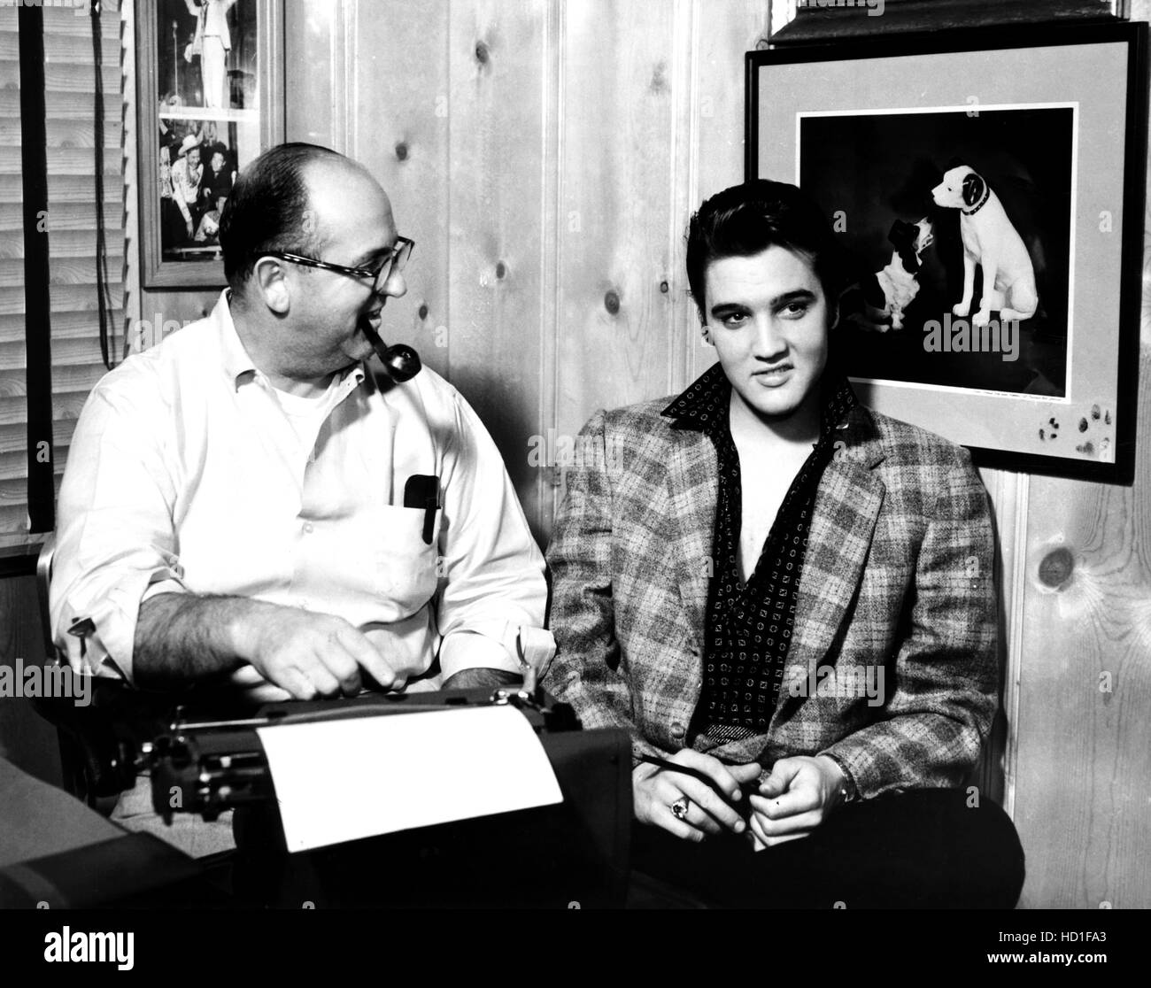 Elvis Presley, right, with his manager, 'Colonel' Tom Parker, January