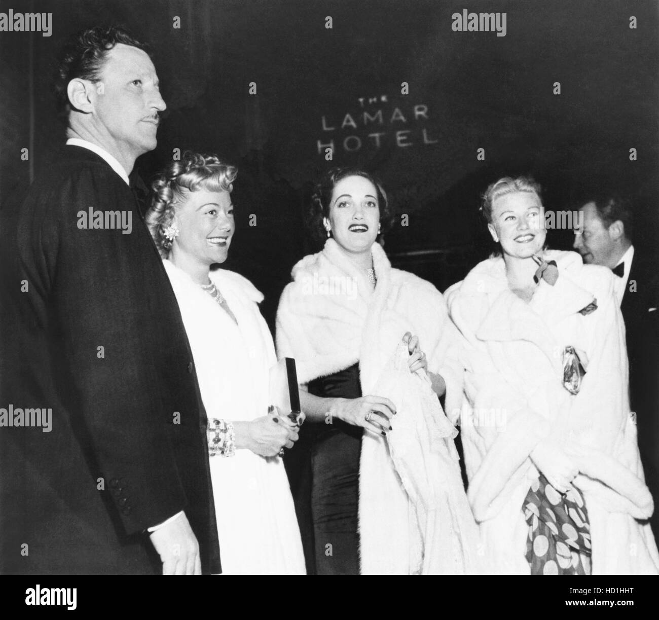 Left from second left: Sonia Henie, Dorothy Lamour, Ginger Rogers all wearing ermine at the world premier of THE GREEN PROMISE, Stock Photo