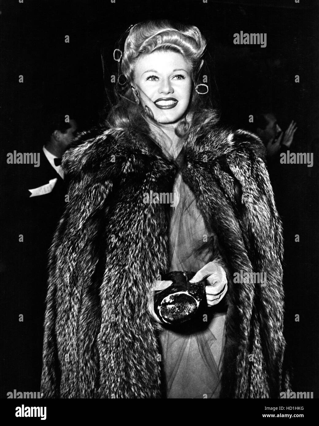 GINGER ROGERS, arrives for the premiere of "Lady in the Dark", c. 1944