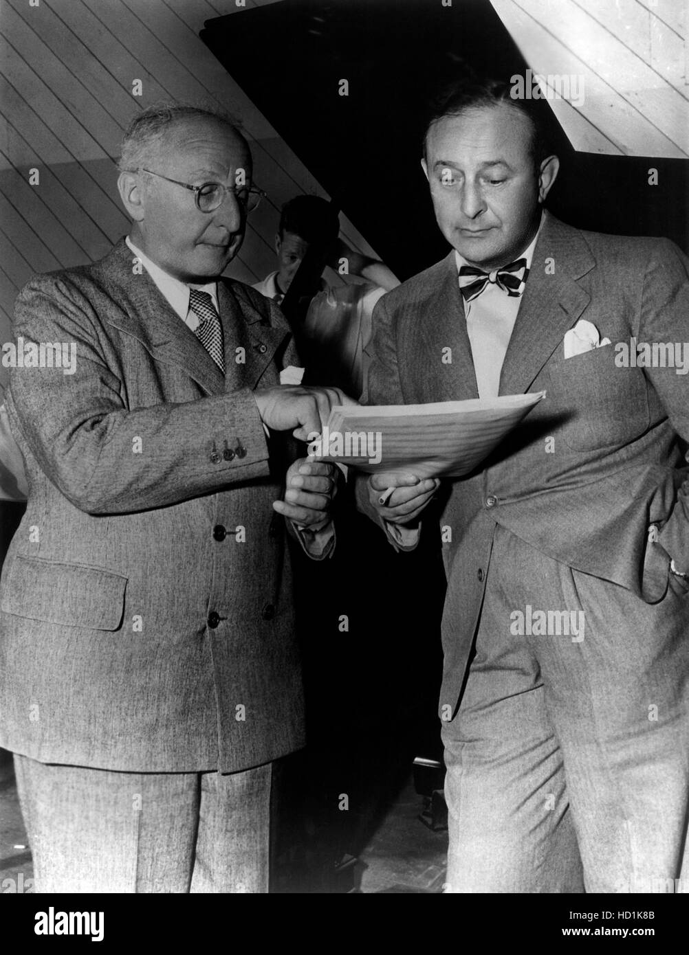 Jerome Kern and producer Arthur Freed confer on one of Kern's songs