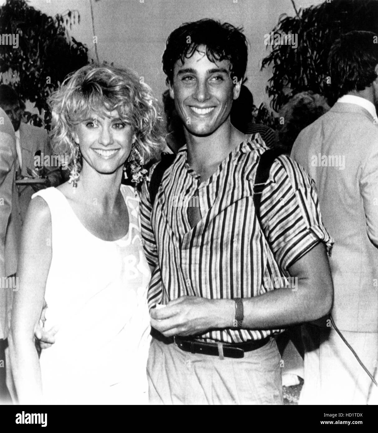 Olivia Newton-John, left, with her fiance, actor Matt Lattanzi, July 1984 Stock Photo